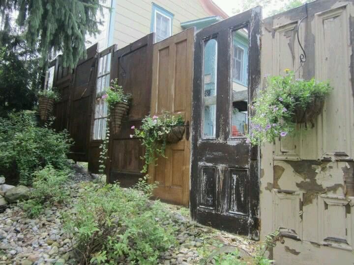 Love this - Privacy Fence made from old doors | Backyard fences, Fence  design, Outdoor